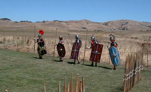 Gaius Germanicus Magnus, Patti Ballard, Marcus Scipio, and Antony Lucius with Centurio Marcus at right prepare to attack.